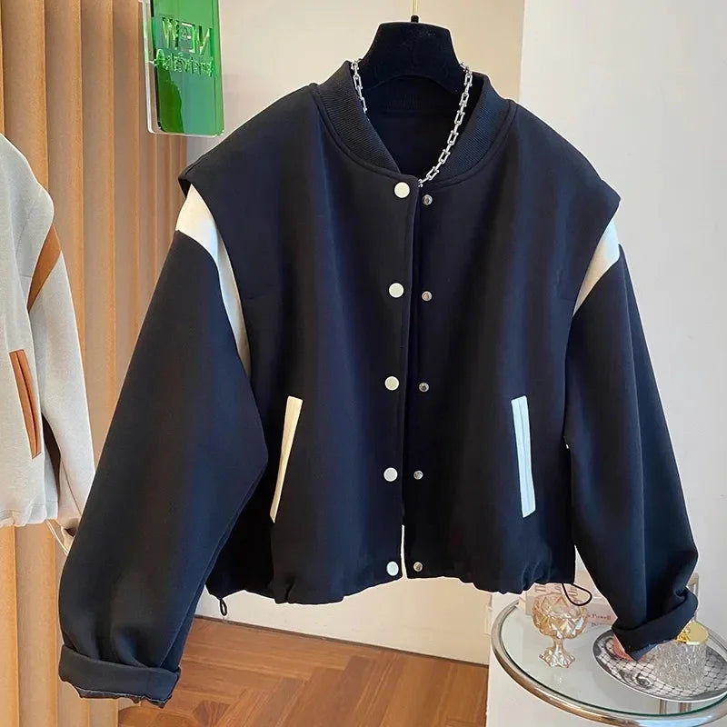 Stand Collar Baseball Jacket: Patchwork design, cozy fit, spring wardrobe essential.