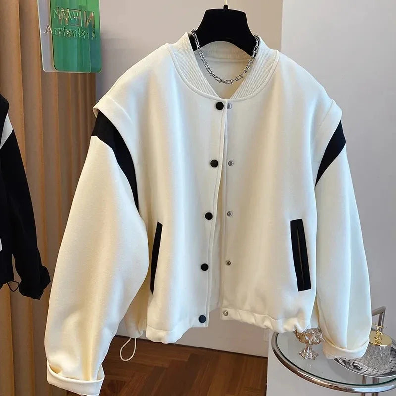 Stand Collar Baseball Jacket: Patchwork design, cozy fit, spring wardrobe essential.